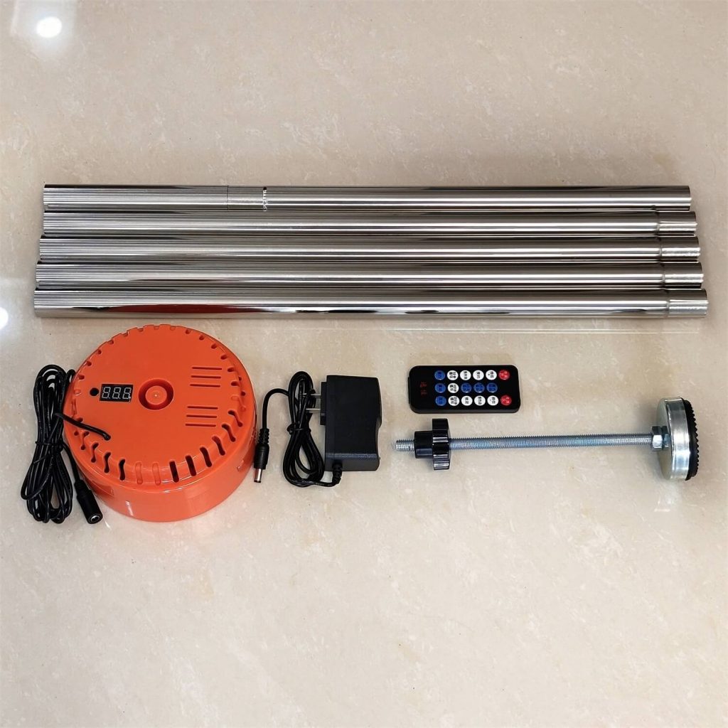 Ceiling Vibrator V2 complete kit with orange main unit, support rods, remote, power adapter and adjustable base